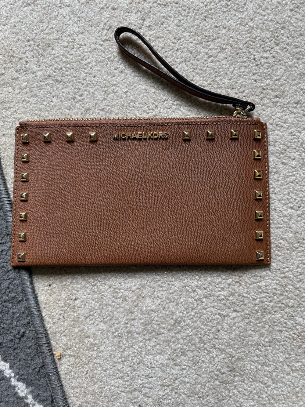 Michael Kors Tan Leather Zip Wristlet with Gold Hardware and studs